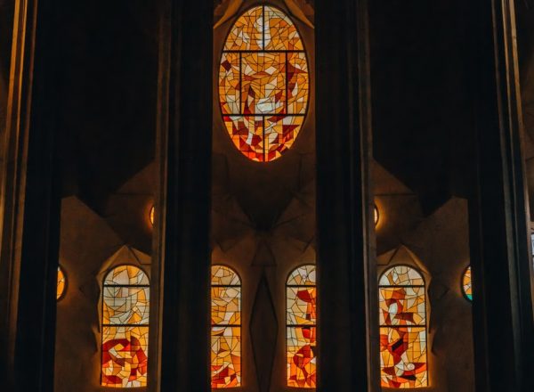Intricate stained glass windows inside Sagrada Familia, Barcelona.